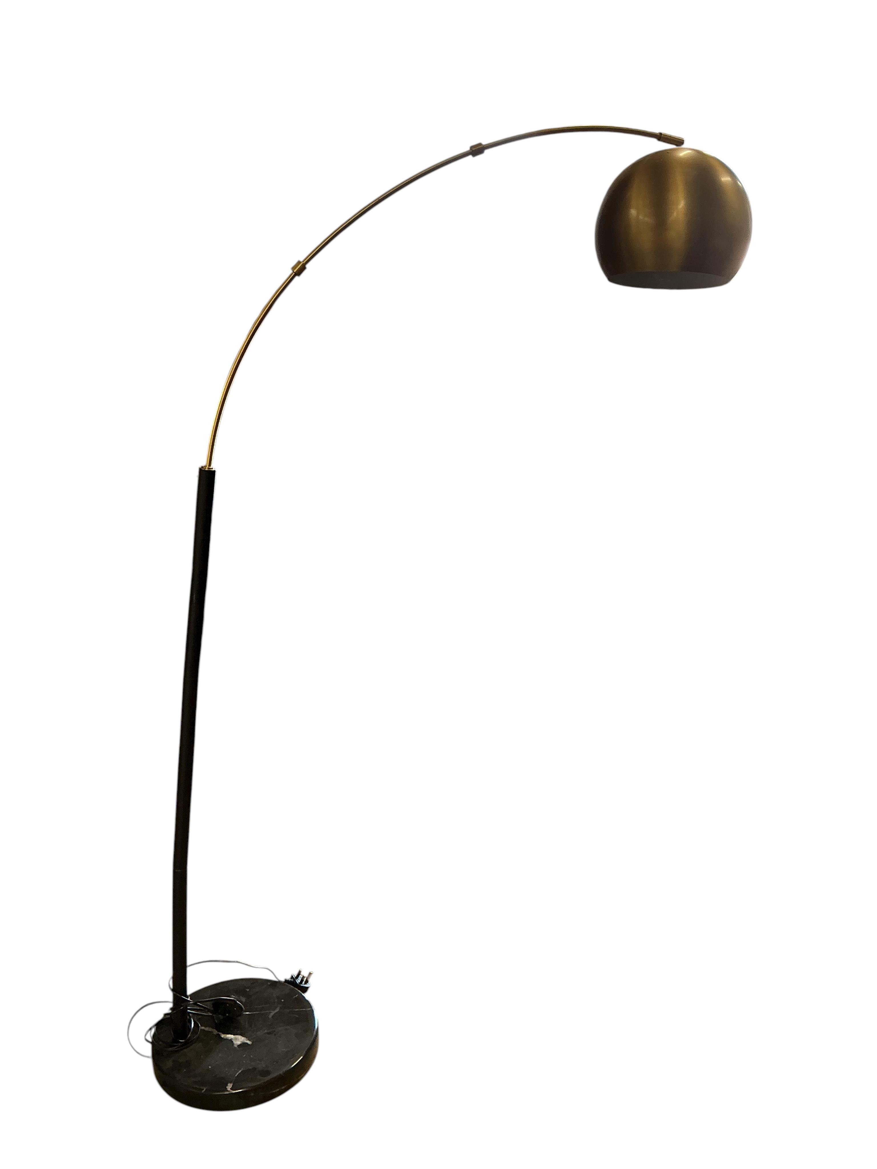 A Contemporary gilt metal and reconstituted marble arc floor lamp, height 181cm